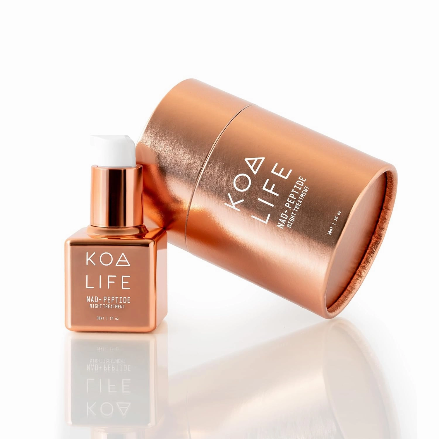 KOA Life NAD Peptide Facial Daily Anti-Aging Serum. in a Metallic Copper Glass Dropper Bottle and Metallic Copper Outer Cylinder Carton